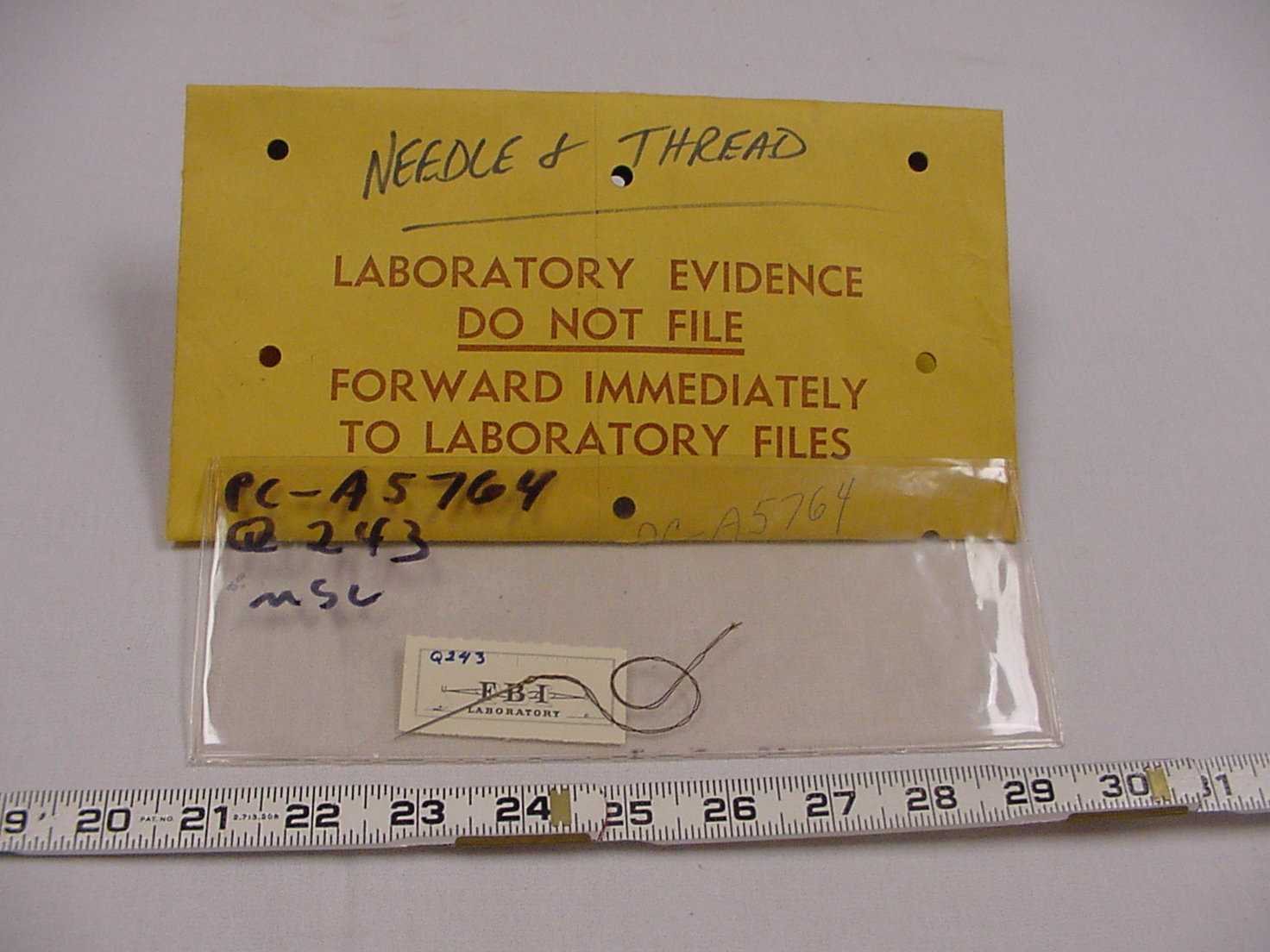 needle and thread laboratory envelope 2.jpg